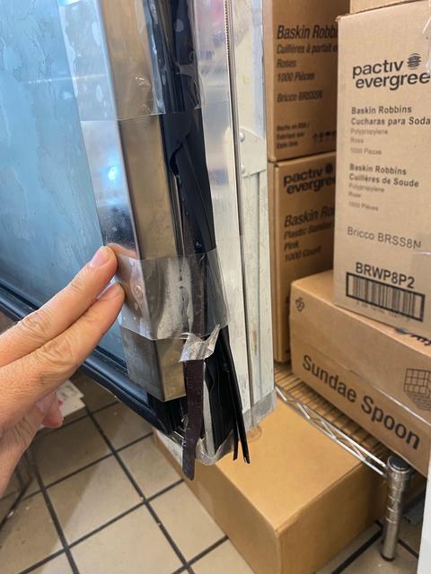 Damaged or displaced door gasket and tape.