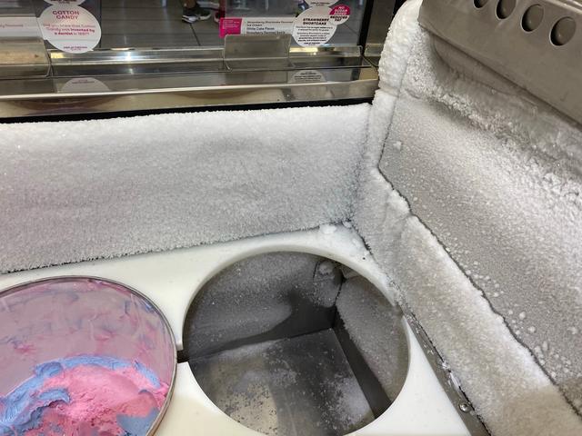 Close view of ice at the tub opening.