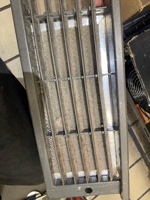 Heavily contaminated condenser air filter.