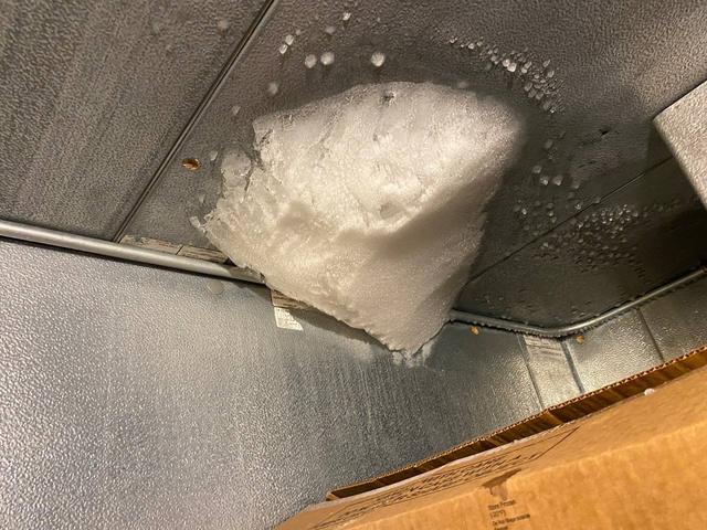 Heavy ice at an interior ceiling corner.
