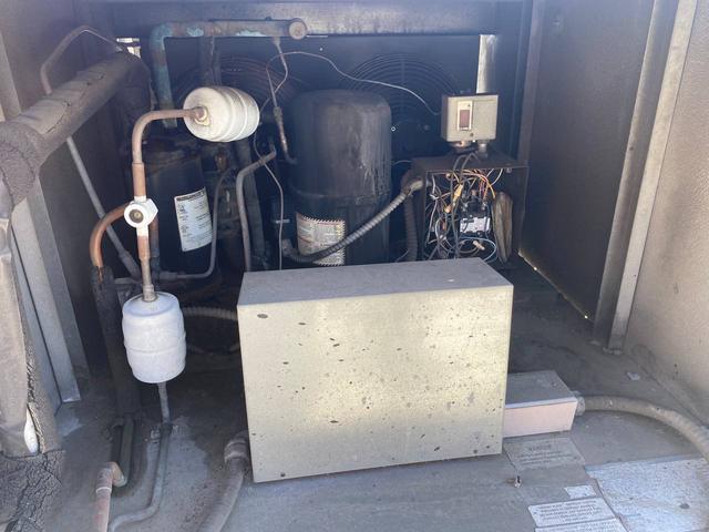 Compressor, piping and two in-line filter-driers.