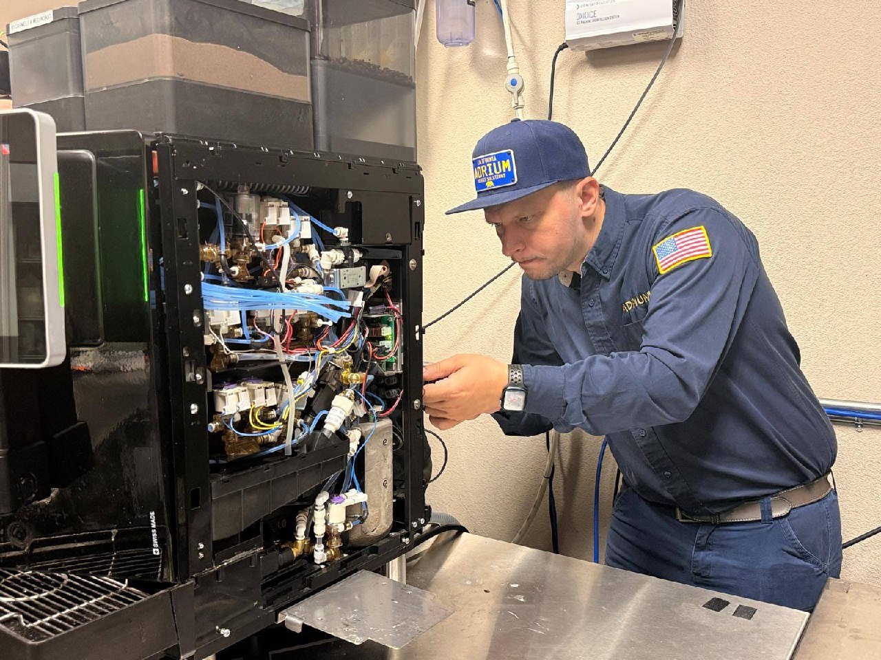 Andrew examining the inside of an open Franke A-Series machine