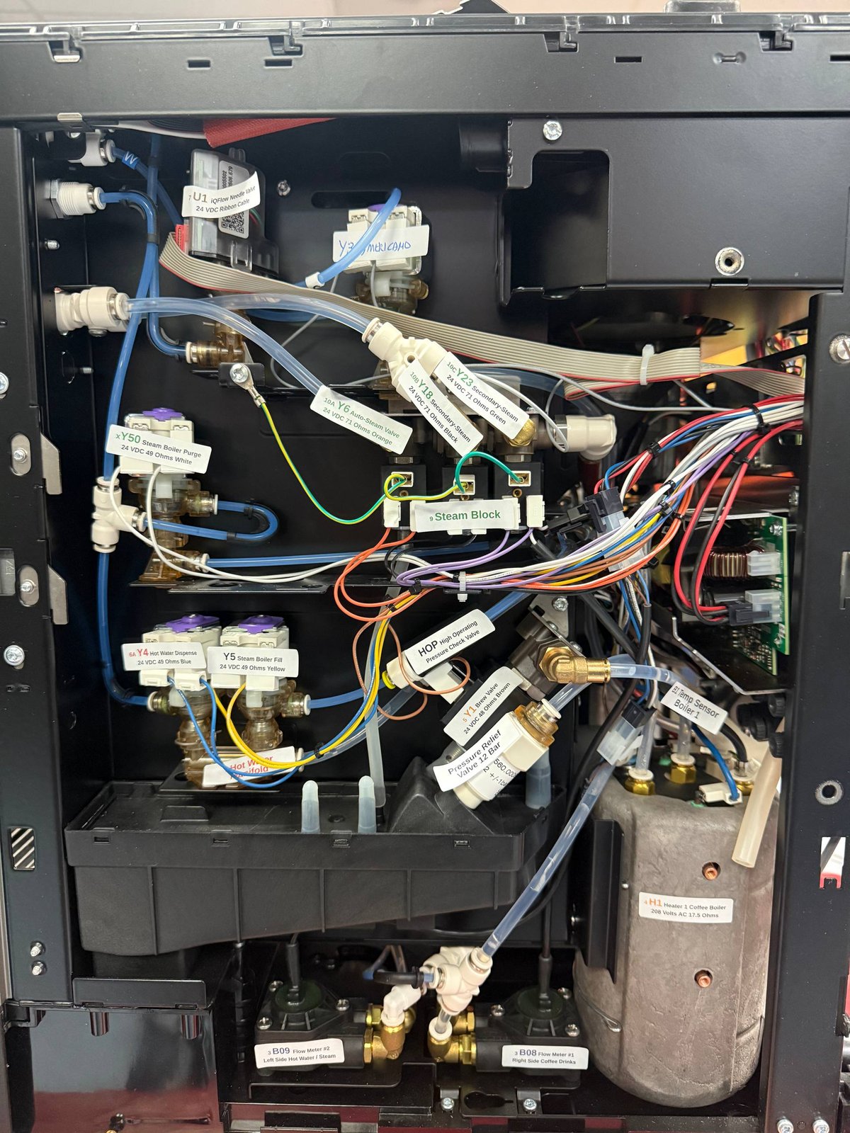 Valves and steam block visible inside a Franke coffee machine