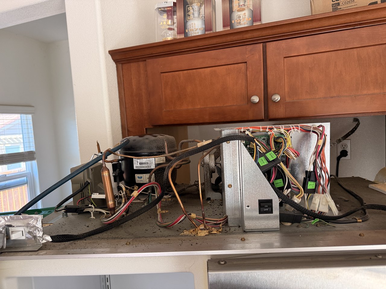 KitchenAid built-in side-by-side refrigerator with the compressor compartment on top repair in Danville, CA by ADRIUM, photo 1
