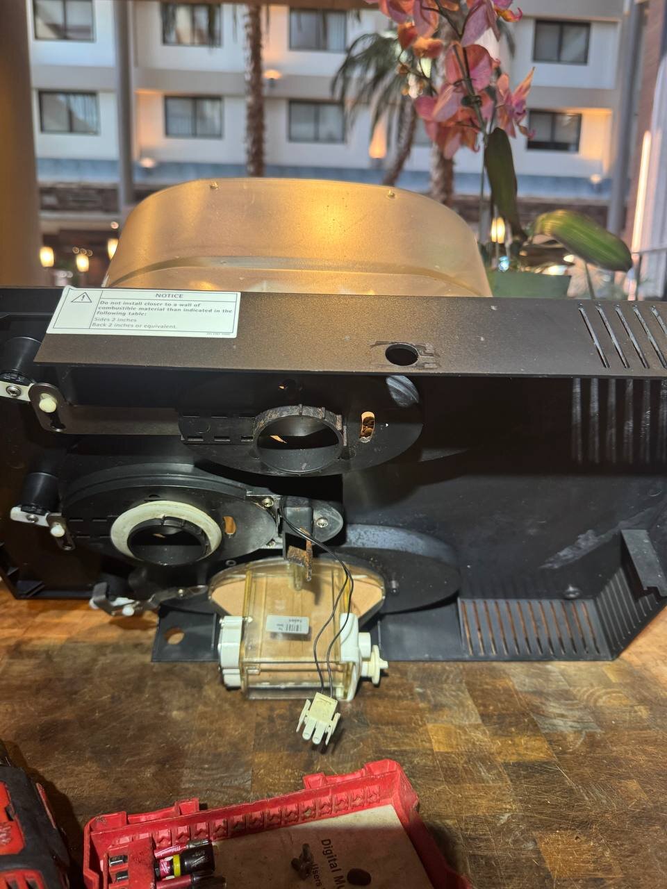 WMF machine opened for service with the hotel atrium in the background